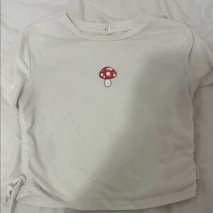 Charming White Kids' Tee with Red Mushroom Print